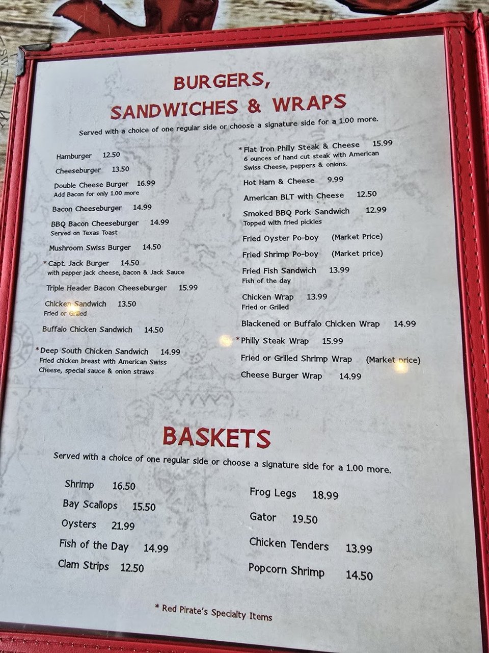 Oyster bar menu with shrimp and fish dishes.